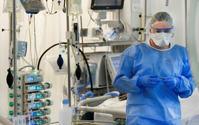 A healthcare worker in a hospital in Maastricht, Netherlands, pictured wearing full personal protective gear. The country has been in full lockdown since before Christmas. Photo: REUTERS / Piroschka van de Wouw / File Photo