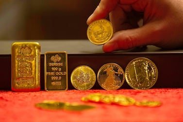 Gold bullion examples. Anglogold has found itself in a dilemma at home. AFP