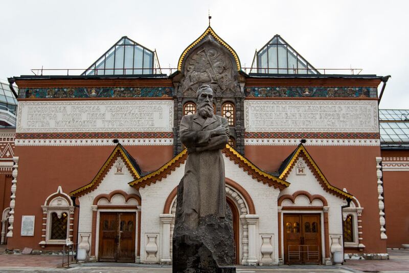 In this photo taken on Thursday, Feb. 11, 2016, a view of the Tretyakov State Gallery museum with the statue of the founder of the gallery Pavel Tretyakov in the center in Moscow, Russia. Police have arrested a man on charges of vandalizing a famous painting by renowned Russian artist Ilya Repin in Moscow's Tretyakov Gallery, it was reported on Saturday, May 26, 2018. (AP Photo/Alexander Zemlianichenko)