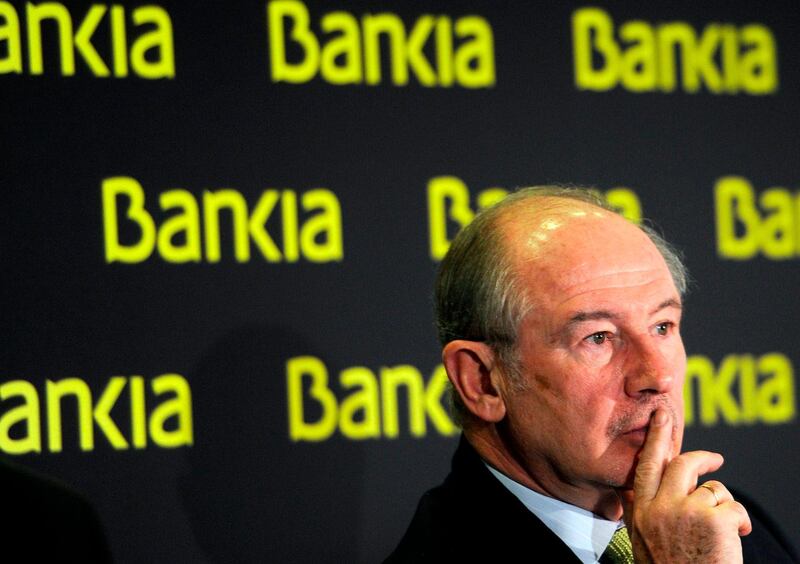 (FILES) In this file photo taken on February 10, 2012 Bankia's Chairman Rodrigo Rato gives a press conference to announce the 2011 annual results in Madrid on February 10, 2012.  A mega-trial that harks back to the dark years of Spain's economic crisis kicks off on November 26, 2018 over the alleged fraudulent 2011 listing of financial giant Bankia, with former IMF leader Rodrigo Rato in the dock. The Spanish state was forced to step in to prevent the bank's collapse and then to borrow 41.3 billion euros from the EU to keep Spain's banking sector afloat.
 / AFP / Dominique FAGET
