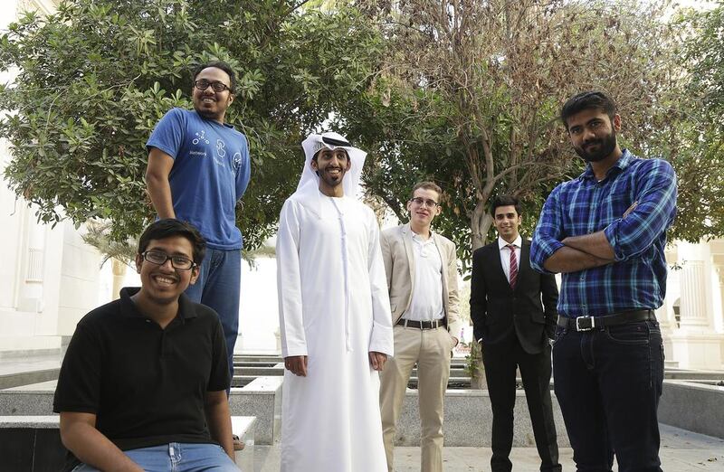 The Hackathon Fintech event’s winning team, Sahim, included, from left to right: Wasi Rehman, 16; Saif Rehman, 22; Hashim Alzaabi, 23; Abdulla Alhajkhalil, 22; Vinay Naresh, 22; and Mohamed Rashid, 23. Jeffrey E Biteng / The National 
