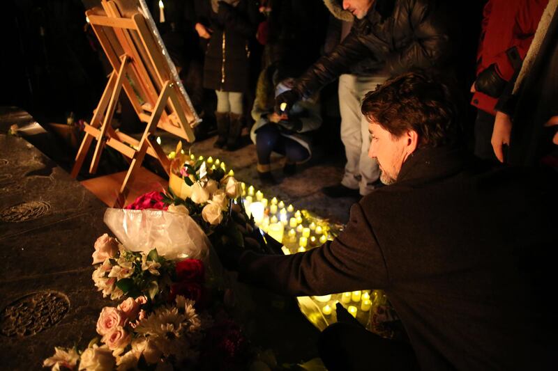 OTTAWA, ON - JANUARY 09: Justin Trudeau Prime Minister of Canada place flowers on Parliament Hill during vigil for the victims who were killed in a plane crash in Iran on January 9, 2020 in Ottawa, Canada.   Dave Chan/Getty Images/AFP