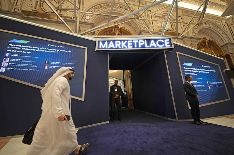 An attendee visits the Marketplace zone on the opening day of the Future Investment Initiative (FII) forum at the Ritz Carlton hotel in Riyadh, Saudi Arabia. Bloomberg
