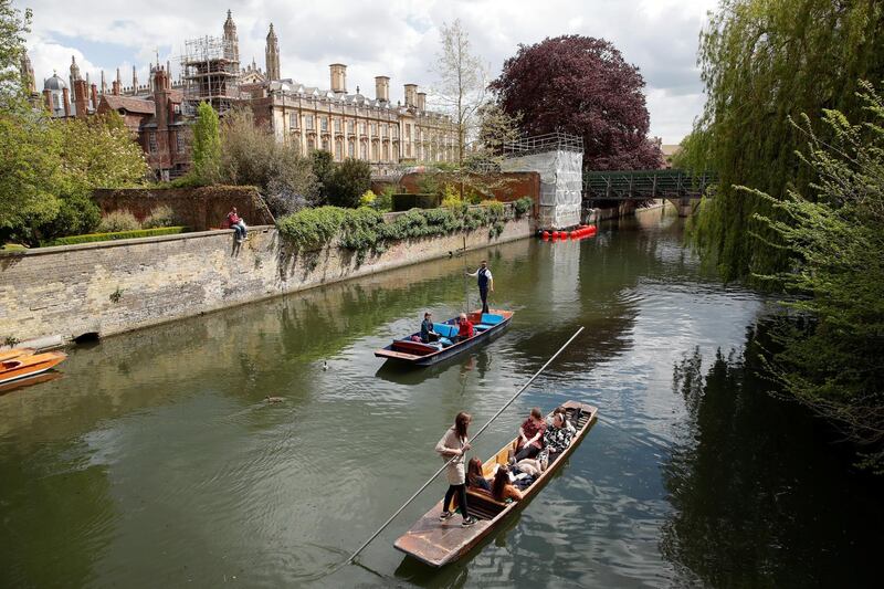 Punting on the River Cam in Cambridge, England, is set to be a popular attraction as coronavirus restrictions are eased. Reuters