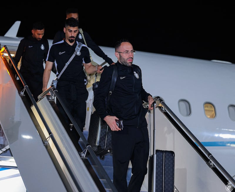 Al Nassr players arrive at Zayed International Airport in Abu Dhabi ahead of the Saudi Super Cup. Reuters 