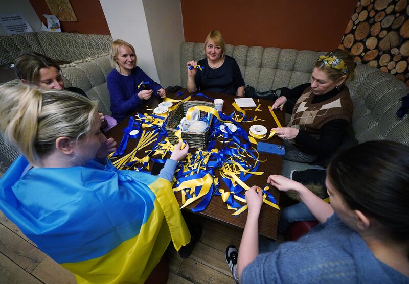 Volunteers making ribbons at the Ukrainian Social Club in Holland Park, London.
