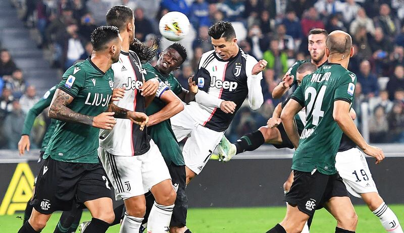 Juventus' Cristiano Ronaldo (C) in action during the Italian Serie A soccer match between Juventus FC and Bologna FC in Turin, Italy.  EPA