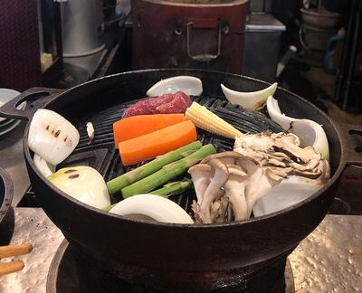 Make a beeline for Sapporo Genghis Khan in Susukino, where you'll grill your own meat and veggies with the locals. Courtesy Declan McVeigh