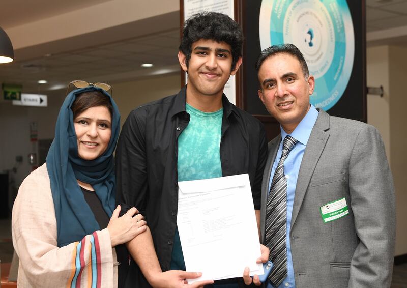 Mohammed Hamzah Ahmad celebrates results day with his parents.
