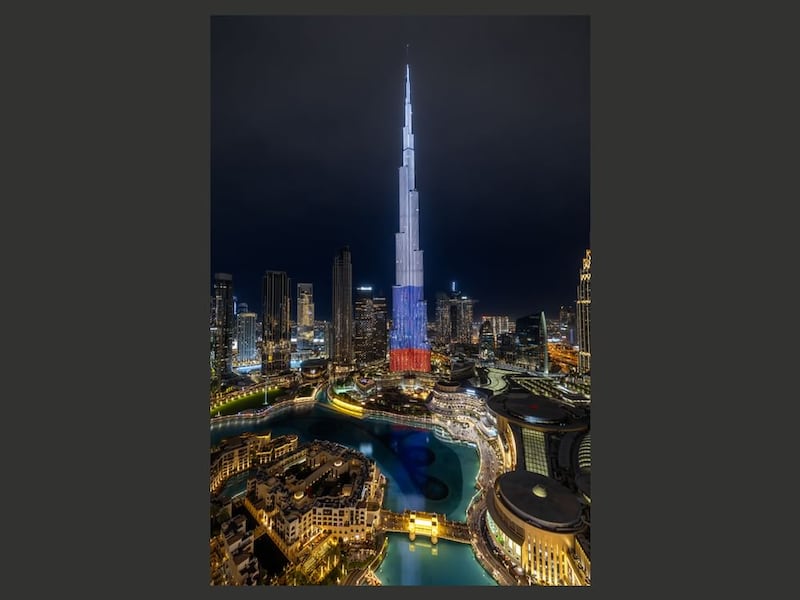 Dubai's Burj Khalifa, the world's tallest skyscraper, lit up in the colours of the Russian flag.