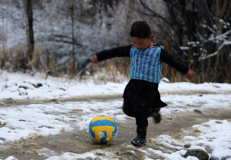 Murtaza Ahmadi became an Internet sensation after wearing a plastic bag Lionel Messi Argentina shirt went viral. AFP