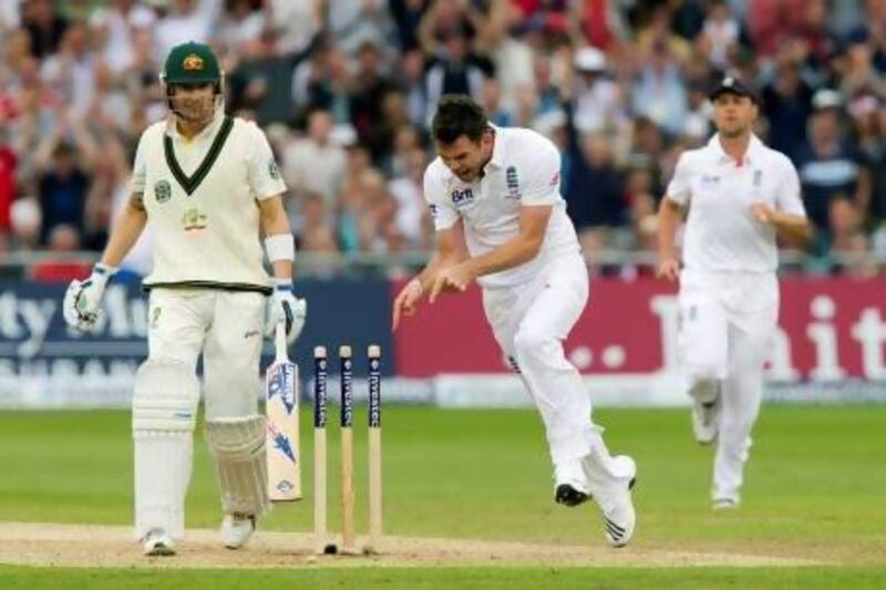 England's James Anderson, centre, celebrates after bowling out Australia's captain Michael Clarke.