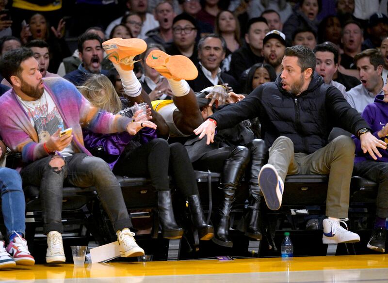 Los Angeles Lakers star LeBron James ends up in the crowd during a game against the Los Angeles Clippers at the Crypto.com Arena. Reuters

