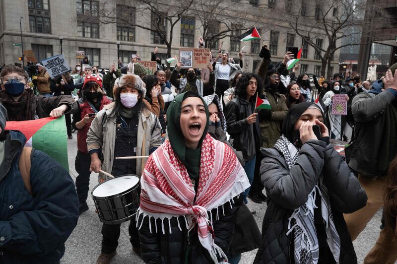 Pro-Palestinian demonstrators rally outside of Chicago's City Hall in January. Anti-Biden Democrats are planning to cast blank ballots in the Illinois primary. Getty via AFP