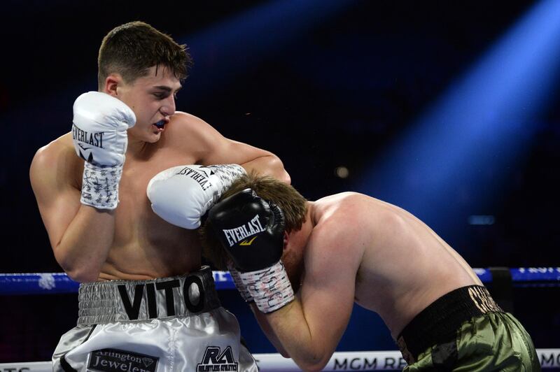 Vito Mielnicki (white trunks) and Corey Champion (green trunks) box during their welterweight bout at MGM Grand Garden Arena,  Las Vegas.  Reuters