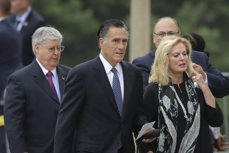 US Senate candidate Mitt Romney and his wife Anne Romney arrive at the Washington National Cathedral. Getty Images / AFP