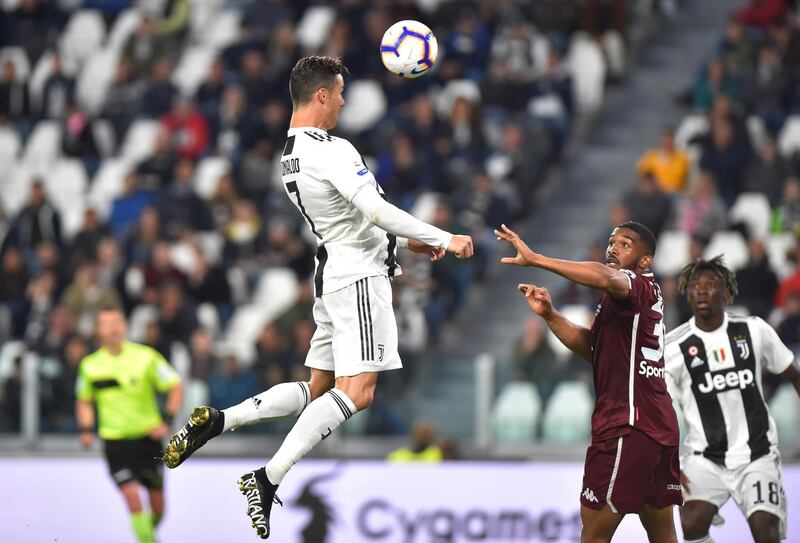 Cristiano Ronaldo scores a headed equaliser against Torino. EPA