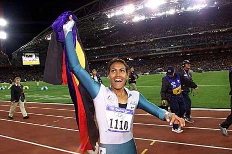 Australia's Cathy Freeman celebrates her 400-metre Olympic gold medal in Sydney.