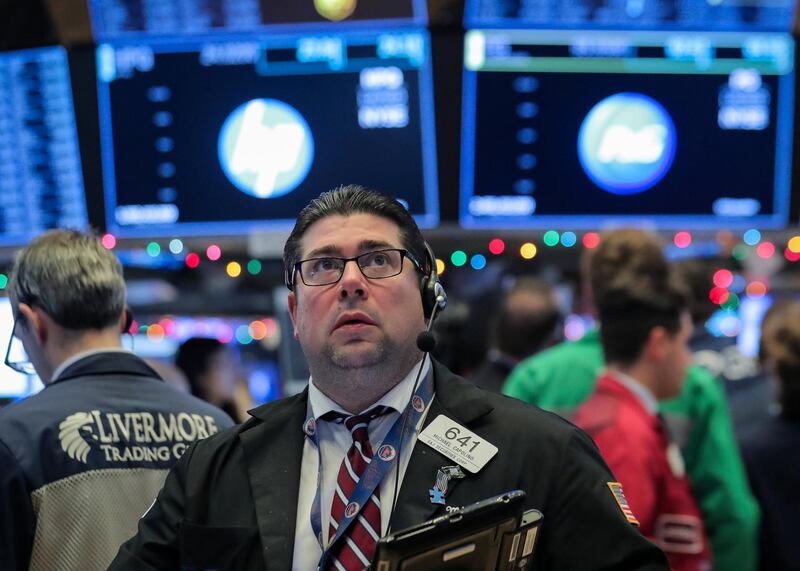 Traders work on the floor of the New York Stock Exchange (NYSE) in New York, U.S., December 7, 2018. REUTERS/Brendan McDermid