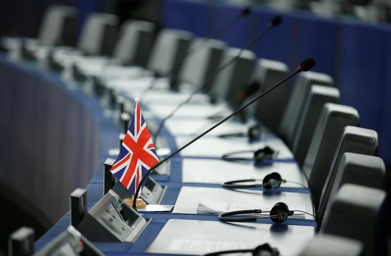 A British Union Jack flag is seen on the desk of a Member of the European Parliament ahead of a debate on Brexit after the vote on British Prime Minister Theresa May's Brexit deal, at the European Parliament in Strasbourg, France, March 13, 2019.  REUTERS/Vincent Kessler