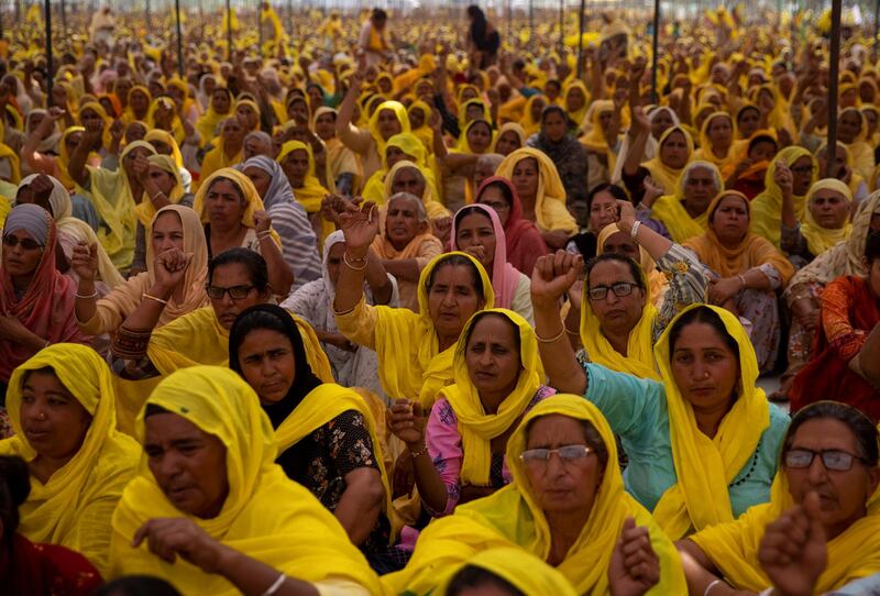 Female farmers protest against farming laws on International Women's Day at Bahadurgarh, India. Reuters