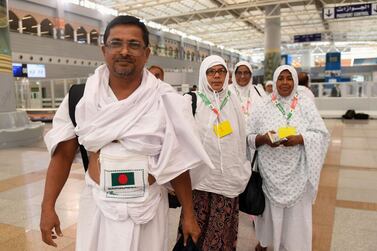 Muslim pilgrims arrive at King Abdulaziz International Airport on July 7, 2019, prior to the annual Hajj pilgrimage in the holy city of Mecca. The Hajj, largest annual pilgrimage in the world, is the fifth pillar of Islam, a religious duty that must be carried out at least once in the lifetime of every able-bodied Muslim who can afford to do so. / AFP / Amer HILABI