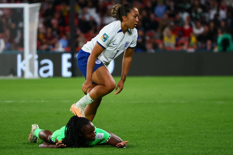 Nigeria's defender Michelle Alozie reacts after being stamped on by England's Lauren James. AFP
