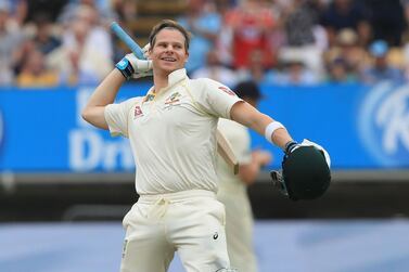 (FILES) In this file photo taken on August 04, 2019 Australia's Steve Smith celebrates reaching his century during play on the fourth day of the first Ashes cricket Test match between England and Australia at Edgbaston in Birmingham, central England on August 4, 2019. An Australia batsman with a technique that departs from the coaching manual piling on the runs in the Ashes -- England have been here before. But should Steve Smith be compared to the greatest of them all, Don Bradman? The pair have been mentioned repeatedly in the same sentence since Smith marked his return to Test cricket following a 12-month ban for his role in a ball-tampering scandal with innings of 144 and 142 during Australia's 251-run win over England in the first Test at Edgbaston last week. - RESTRICTED TO EDITORIAL USE. NO ASSOCIATION WITH DIRECT COMPETITOR OF SPONSOR, PARTNER, OR SUPPLIER OF THE ECB / AFP / Lindsey Parnaby / RESTRICTED TO EDITORIAL USE. NO ASSOCIATION WITH DIRECT COMPETITOR OF SPONSOR, PARTNER, OR SUPPLIER OF THE ECB