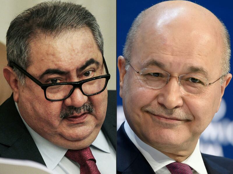 Former Iraqi finance minister Hoshyar Zebari, pictured in 2016, left, and President Barham Saleh are rival candidates for the next presidency. AFP