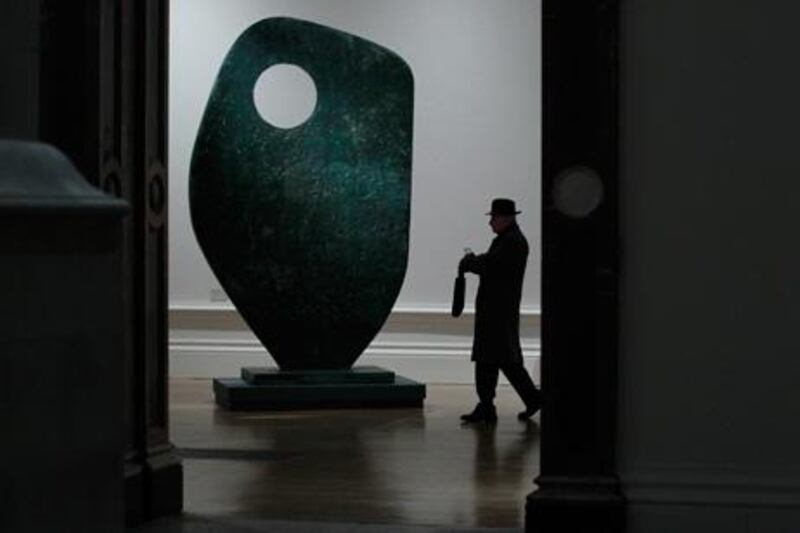 A man walks past Barbara Hepworth’s sculpture Single Form at the Modern British Sculpture exhibition at London’s Royal Academy.