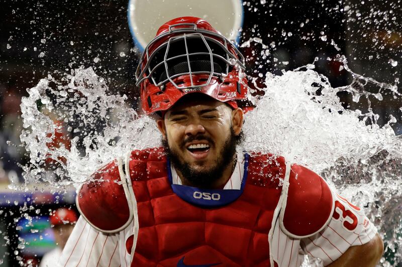 Philadelphia Phillies' Jorge Alfaro is doused with water after a baseball game in Philadelphia. Matt Slocum / AP Photo