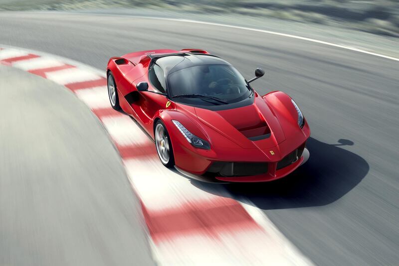 Ferrari's LaFerrari uses a cutting-edge KERS-boosted V12 engine and F1-inspired chassis construction and aerodynamics. (Photo Courtesy-Ferrari) *** Local Caption ***  Ferrari1.jpg