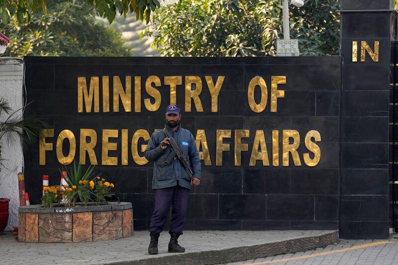 A police officer stands guard at Pakistan's Ministry of Foreign Affairs in Islamabad. AP