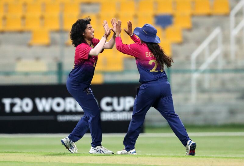 UAE bowler Samaira Dharnidharka, who finished with figures of 3-11, celebrates after taking the wicket of Netherlands' Hannah Landheer for a duck