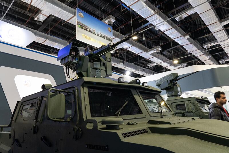 Exhibitors show off armoured vehicles to prospective buyers. Mahmoud Nasr / The National