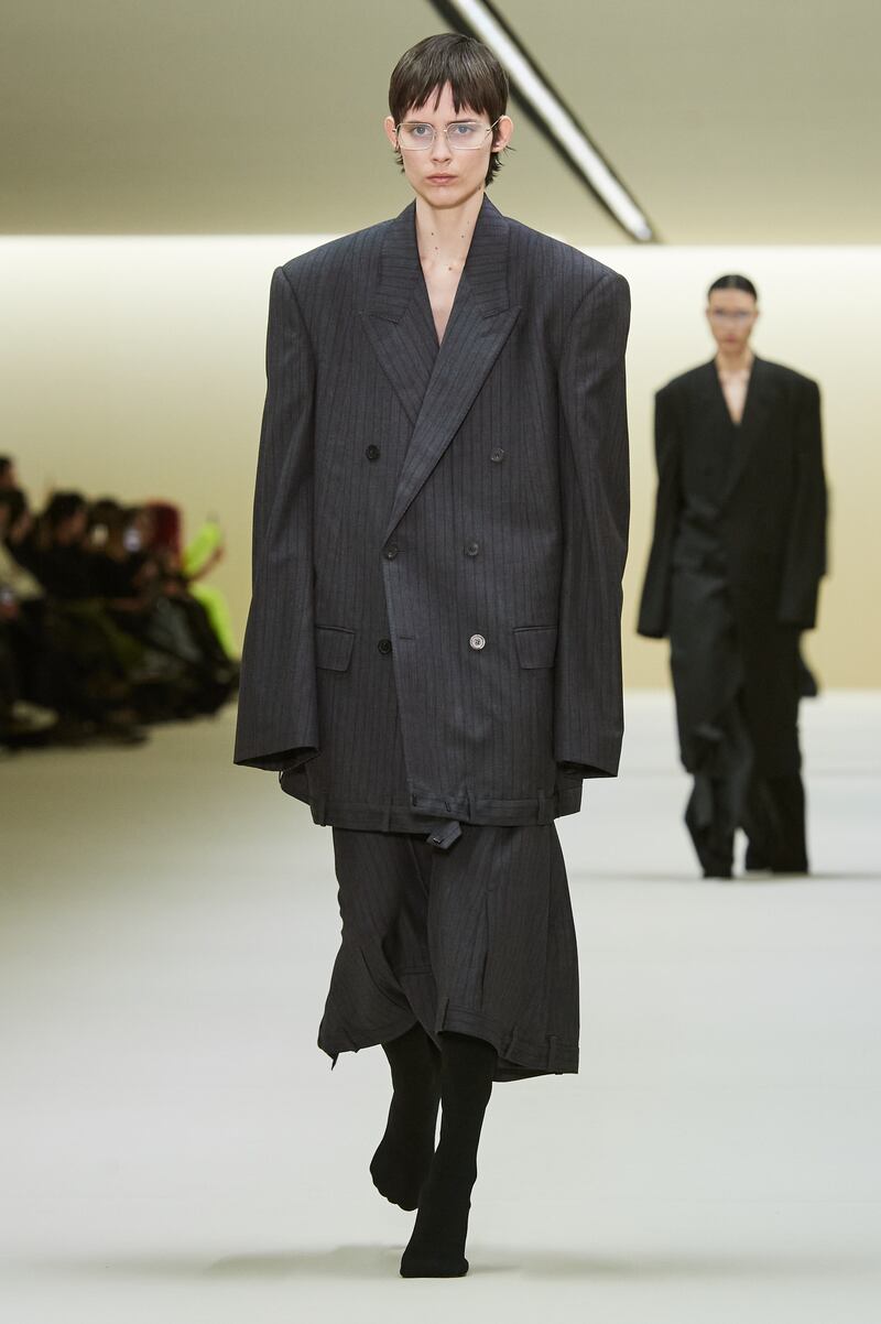 An oversized suit made out of trousers