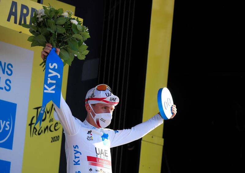 Cycling - Tour de France - Stage 5 - Gap to Privas - France - September 2, 2020. UAE Team Emirates rider Tadej Pogacar of Slovenia, wearing the white jersey for best young rider, celebrates on the podium Pool via REUTERS/Christophe Petit Tesson