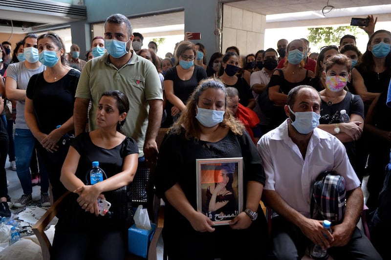 People and employees attend a mass over the victims who were killed in the blast, at the Al-Roum hospital at Ashrafieh area in Beirut.  EPA