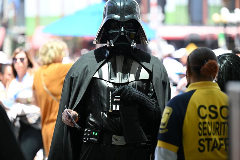 A cosplayer portrays Darth Vader. AFP