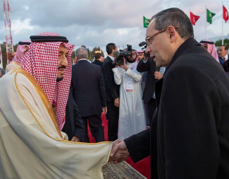 King Salman greets delegates. EPA