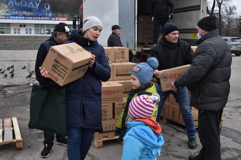 Internally displaced civilians receive humanitarian aid distributed in Zaporizhzhia on February 6, 2024, amid the Russian invasion of Ukraine.  AFP