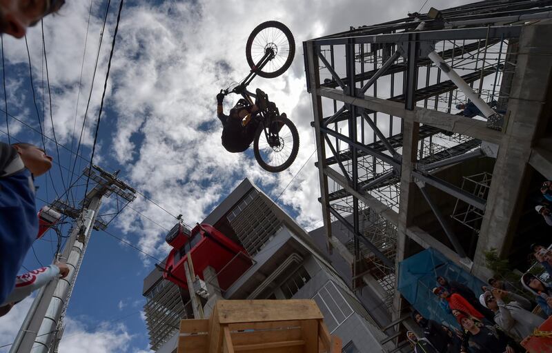 A competitor takes part in the Downhill Urbano event at Ciudad Bolivar, in southern Bogota, on Saturday, October 12.  AFP