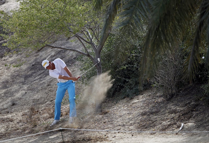 epa03563825 Marcel Siem of Germany plays a shot during the second round of Omega Dubai Desert Classic 2013 at Emirates Golf Club in Dubai, United Arab Emirates, 01 February 2013.  EPA/ALI HAIDER *** Local Caption ***  03563825.jpg