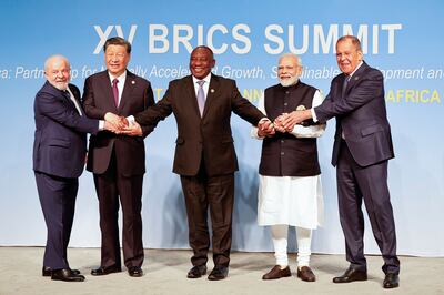 From left, Brazil's President Luiz Inacio Lula da Silva, Chinese President Xi Jinping, South African President Cyril Ramaphosa, Indian Prime Minister Narendra Modi and Russia's Foreign Minister Sergey Lavrov at the 2023 Brics summit in Johannesburg. AFP
