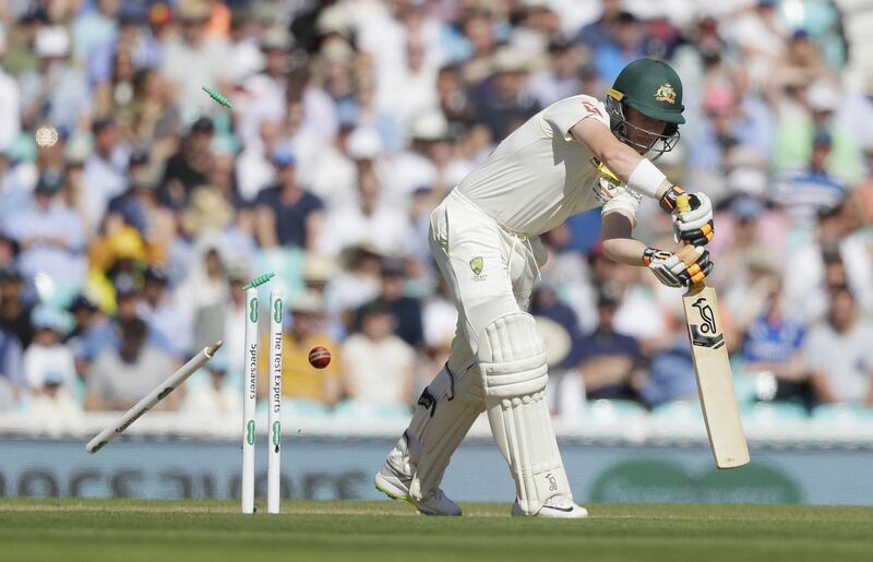 Australia's Marcus Harris is bowled by England bowler  Stuart Broad. AP