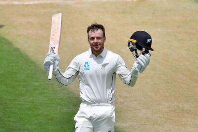 New Zealand's Tom Blundell celebrates 100 runs during day three of the first Test cricket match between New Zealand and the West Indies at the Basin Reserve in Wellington on December 3, 2017. (Photo by Marty MELVILLE / AFP) / “The erroneous mention[s] appearing in the metadata of this photo by Marty MELVILLE has been modified in AFP systems in the following manner: [Tom Blundell] instead of [Tom Blunder]. Please immediately remove the erroneous mention[s] from all your online services and delete it (them) from your servers. If you have been authorized by AFP to distribute it (them) to third parties, please ensure that the same actions are carried out by them. Failure to promptly comply with these instructions will entail liability on your part for any continued or post notification usage. Therefore we thank you very much for all your attention and prompt action. We are sorry for the inconvenience this notification may cause and remain at your disposal for any further information you may require.”