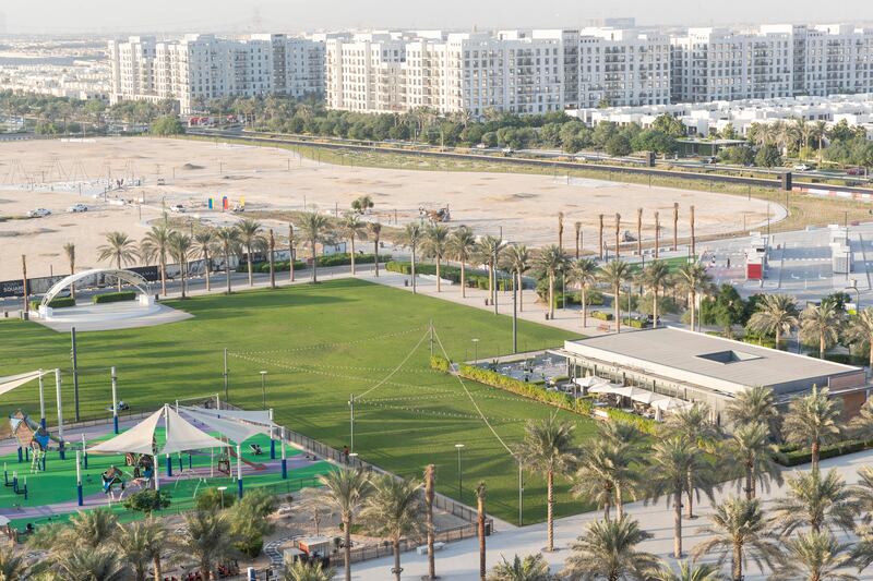 Views from her balcony include a green communal area
