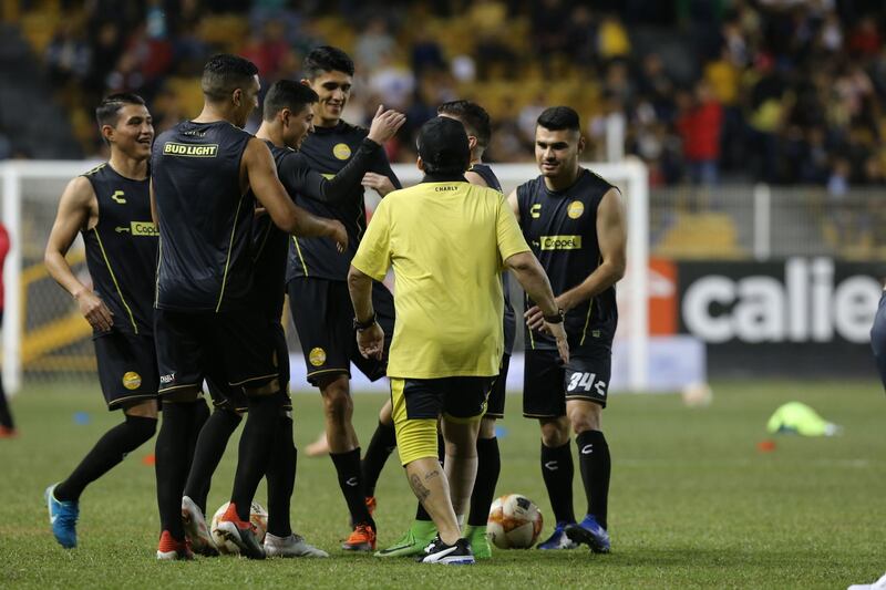 Maradona gives instructions to his players. Getty Images