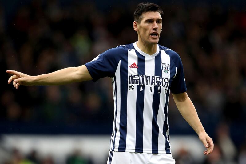 In this Saturday, Sept. 16, 2017 photo, West Bromwich Albion's Gareth Barry gestures,  during the English Premier League soccer match against West Ham United,  at The Hawthorns, in West Bromwich. Barry will make a record 633rd Premier League appearance if he is selected by West Bromwich Albion against Arsenal on Monday, Sept. 25, 2017. Barry is currently level with Manchester United great Ryan Giggs on 632 appearances.   (Nick Potts/PA via AP)