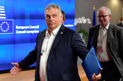 FILE - In this Saturday, July 18, 2020, file photo, Hungary's Prime Minister Viktor Orban gestures at an EU summit in Brussels. Hungary's prime minister says that his country won a â€œvery important battleâ€ at the European Union summit this week, where national leaders of the 27-member bloc decided an seven-year budget and economic recovery package to counter the effects of the coronavirus pandemic. (John Thys, Pool Photo via AP, File)